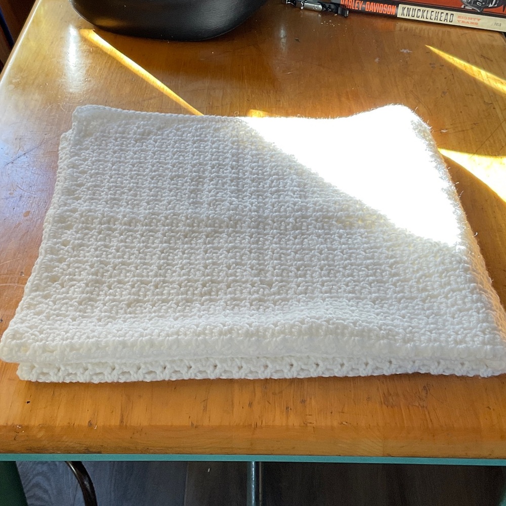 Handmade white crochet blanket